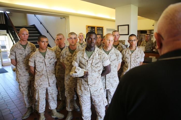 Recruits of Bravo Company, 1st Recruit Training Battalion, listen as a museum docent share his knowledge during their museum visit at Marine Corps Recruit Depot San Diego, Oct. 7. Docents guided the recruits during the tour and are Marine Corps veterans who have lived through the history dating back to the Korean War. Today, all males recruited from west of the Mississippi are trained at MCRD San Diego. The depot is responsible for training more than 16,000 recruits annually. Bravo Company is scheduled to graduate from recruit training on Oct. 23.