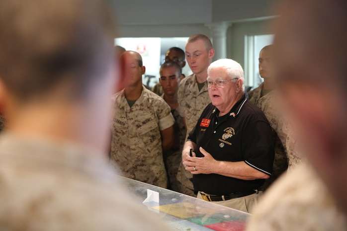 Recruits of Bravo Company, 1st Recruit Training Battalion, listen to Gregg Stoner, museum docent, Command Museum, as he shares his knowledge of the Korean War during their museum visit at Marine Corps Recruit Depot San Diego, Oct. 7.  The museum’s docents are Marine Corps veterans who lived the Marine Corps history dating back to the Korean War. During the recruits’ visit, docents take them on a tour and explain each section and use their personal experiences to back up the artifacts. Today, all males recruited from west of the Mississippi are trained at MCRD San Diego. The depot is responsible for training more than 16,000 recruits annually. Bravo Company is scheduled to graduate from recruit training on Oct. 23.