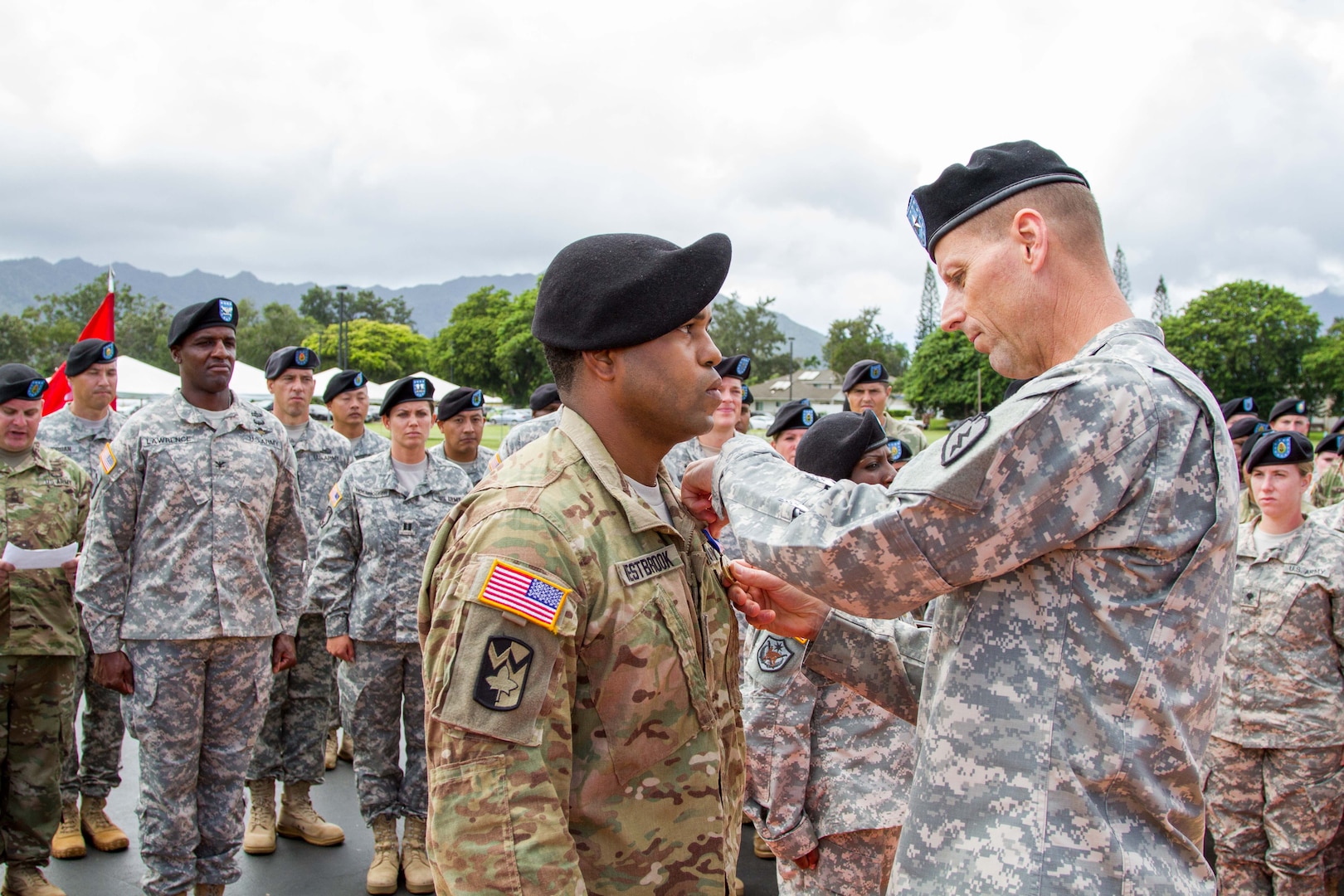 SCHOFIELD BARRACKS, Hawaii - The 25th Infantry Division's Deputy Commanding General-Support, Brig. Gen. Patrick Matlock, pins the Soldier's Medal to Sgt. Jonathan Westbrook's uniform during a ceremony at Weyand Field, Oct. 7, 2015. Westbrook received the prestigious medal for his heroic actions during the Fort Hood, Texas, shooting April 2, 2014. 