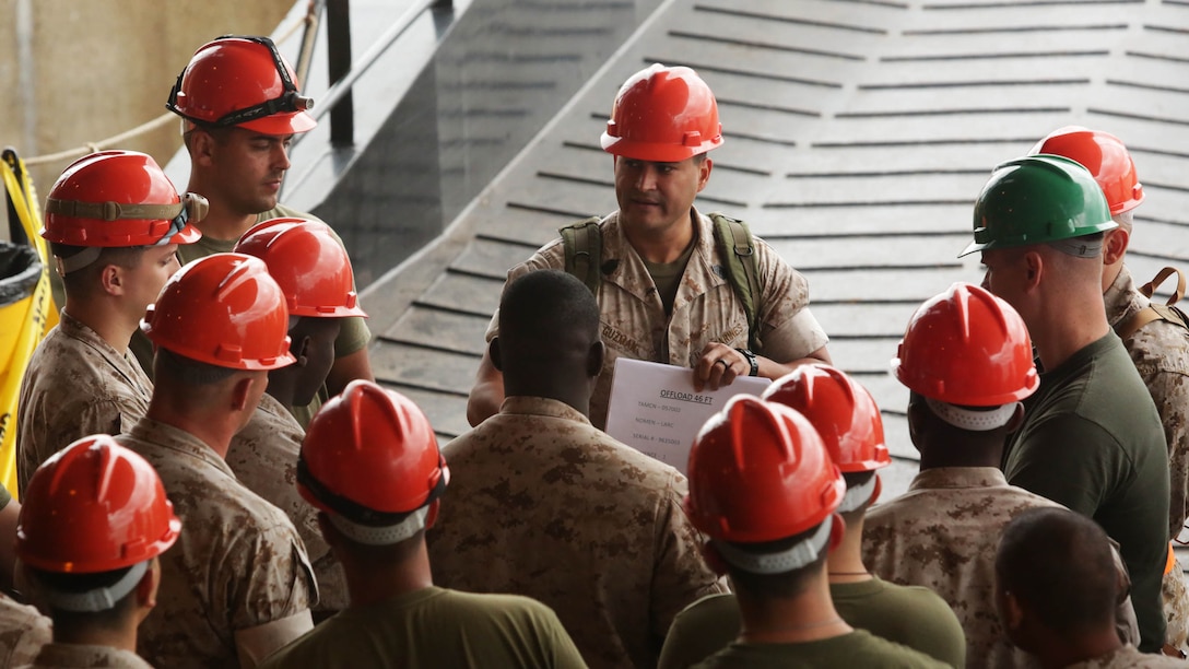 Marines from 4th Light Armored Reconnaissance Battalion unload more than 130 pieces of cargo from the USNS Sergeant William R. Button in Rota, Spain, to prepare for Exercise Trident Juncture 15, the largest NATO exercise in ten years, Oct. 21. Trident Juncture includes more than 30 nations and 36,000 service members from 230+ units.