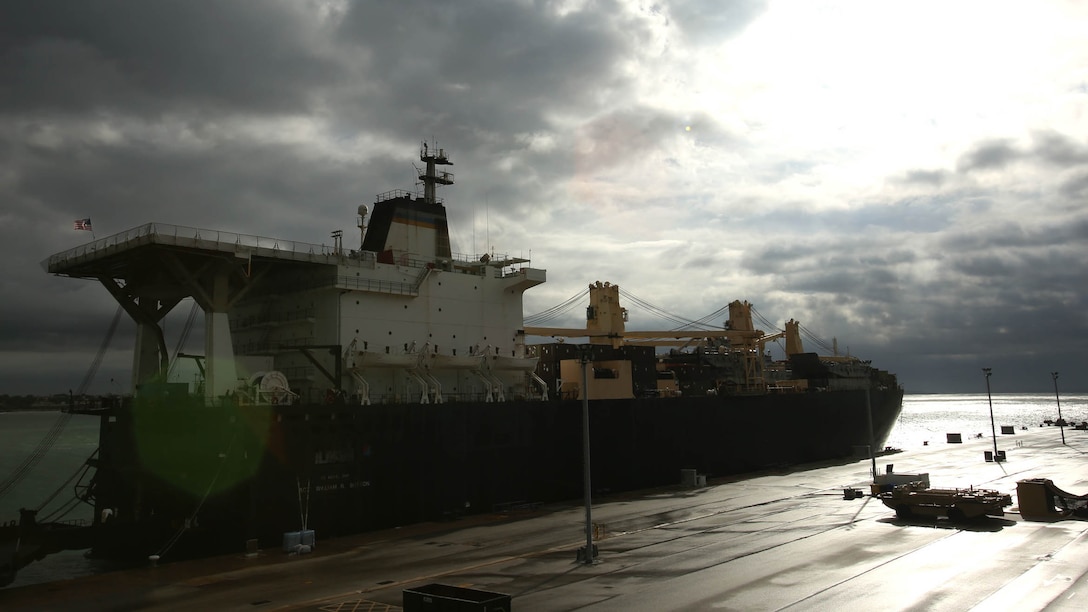 The USNS Sergeant William R. Button sits on the port of Naval Air Base Rota, Spain, to offload equipment capable of enabling crisis response to support Exercise Trident Juncture 15, the largest NATO exercise since 2002, Oct. 21. Prepositioning ships like the USNS Button provide quick and efficient movement of military equipment to operating areas anywhere in the world.