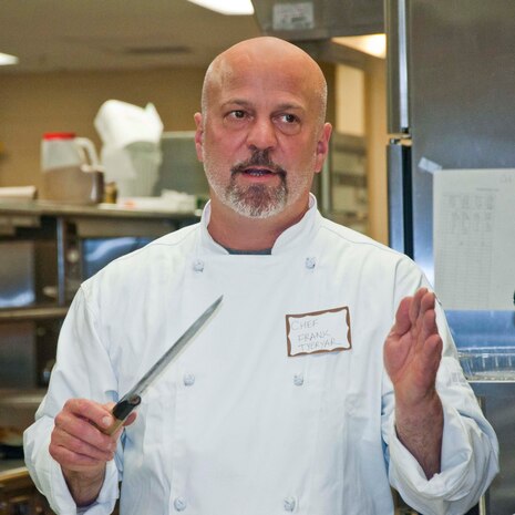 Frank Tyeryar, The Clubs at Quantico and Crossroads Events Center executive Chef, teaches the Basic Culinary and Knife Skills course on Oct. 19 at Clubs of Quantico. As part of a restaurant group in Maryland, Tyeryar helped to open Asian fusion diner, micro breweries, Spanish tapas restaurant, and upscale seafood restaurants.