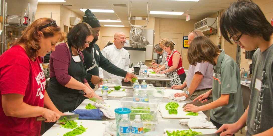 Frank Tyeryar, The Clubs at Quantico and Crossroads Events Center executive Chef, teaches the Basic Culinary and Knife Skills course on Oct. 19 at Clubs of Quantico. The course included hand-on demonstrations of how to cut garlic, onion, peppers and purple potatoes.