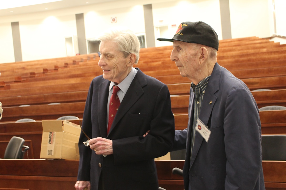John Warner (left) and Louis Buttell (right) talk during their tour of the Warner Center at Marine Corps University on Oct. 16. The two were classmates in the first Special Basic Class of 1950, which held its final reunion at Marine Corps Base Quantico on Oct. 15-16.
