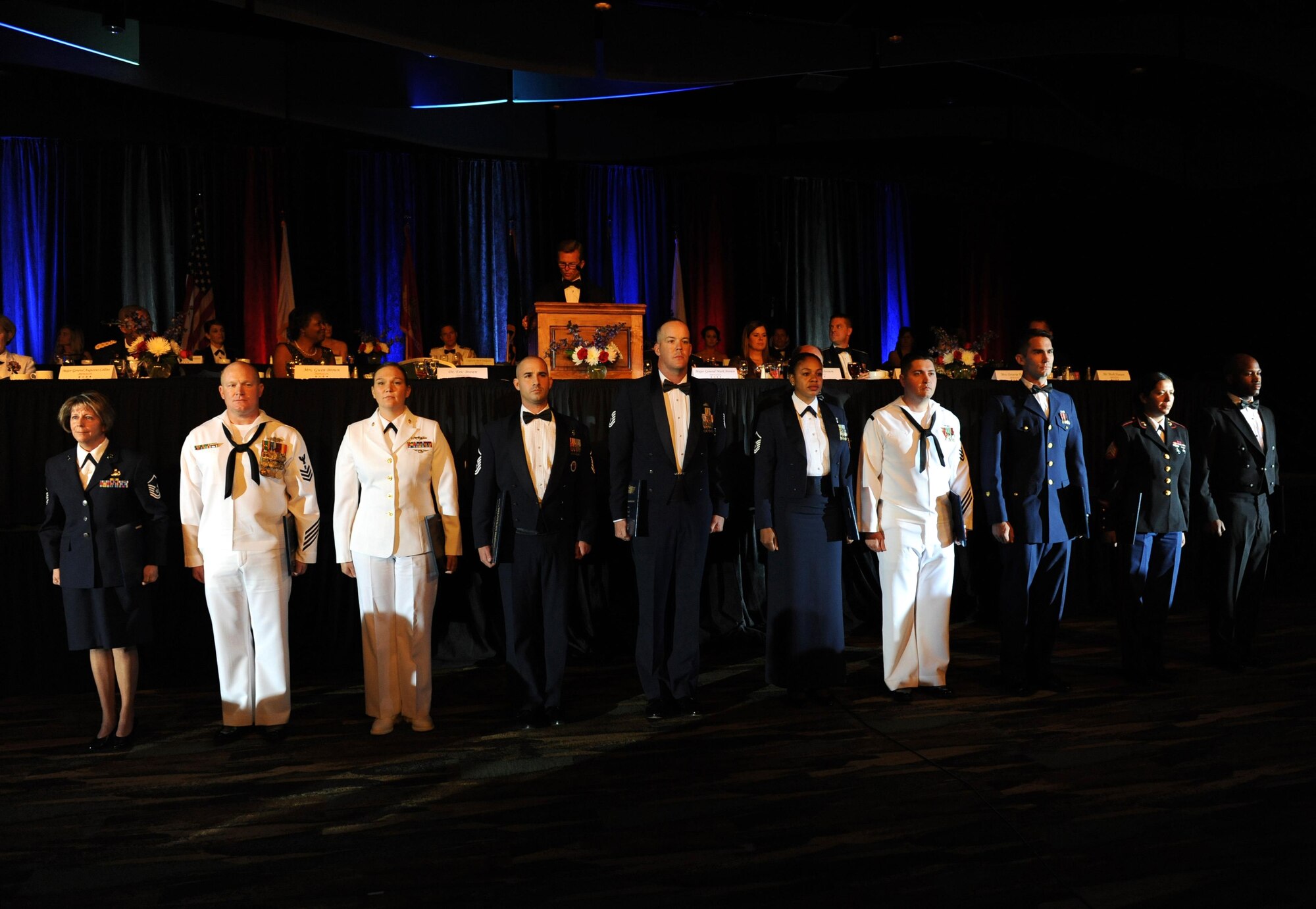 Nominees of the Thomas V. Fredian Community Leadership Award stand in recognition during the 37th Annual Salute to the Military at the Mississippi Coast Convention Center, Oct. 20, 2015, Biloxi, Miss. The Salute to the Military recognizes the men and women who make up our military along the Gulf Coast. (U.S. Air Force photo by Kemberly Groue)