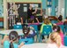 Amber Ludwig, 412th Test Wing American Sign Language interpreter, teaches children at the School Age Annex basic signs in honor of National Disability Employment Awareness Month. (U.S. Air Force photo by Rebecca Amber)