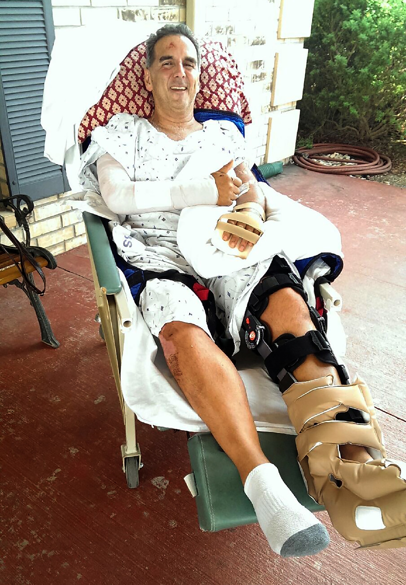 Albert Garcia, 47th Operations Support Squadron radar approach controller and retired master sergeant, poses for a photo at Westover Hills Rehabilitation and Healthcare Center in San Antonio, Texas, Aug. 17, 2015.  Garcia was the victim of a hit-and-run on State Road 277 North, and suffered breaks to multiple bones including his pelvis into two pieces; his upper left leg; his lower left leg; his left arm in three places, cutting to the bone; both wrists; his spine and multiple cuts and scrapes. (Photo provided by the Garcia family)(Released)