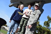Boy Scouts of America's Stephanie Marcinkowski, Roosevelt district chair for the Cradle of Liberty Council, and her son Matthew receive an advance tour of a static display A-10A Warthog from Tech. Sgt. Robert Kaiser, 111th Attack Wing command post technician and assistant Webelos den leader, Oct. 21, 2015, Horsham Air Guard Station, Pennsylvania. Horsham AGS will host an estimated 600 Scouts, Scout leaders, family and prospective recruits as the Cradle of Liberty Council counts down to its Rocketry Recruiting Drive here, Oct. 24, 2015. (U.S. Air National Guard photo by Master Sgt. Christopher Botzum/Released)