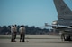 BEJA AIR BASE, Portugal - Crew chiefs assigned to the 52nd Aircraft Maintenance Squadron, Spangdahlem Air Base, Germany, discuss pre-flight procedures prior to a mission at Beja Air Base, Portugal, Oct. 21, 2015. Several F-16 Fighting Falcon fighter aircraft, pilots and support personnel are here in support of Exercise Trident Juncture 15. (U.S. Air Force photo by Airman 1st Class Luke Kitterman/Released)