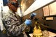 Staff Sgt. Derek Mclemore, 2nd Logistics Readiness Squadron fuels laboratory technician, tests the fuel for dirty particles at Barksdale Air Force Base, La., Oct. 14, 2015. Fuel is tested to ensure it reaches the standard cleanliness which ultimately makes planes run better and last longer. (U.S. Air Force Photo/Airman 1st Class Luke Hill)