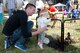 Tech Sgt. Braden Sikkema, an intelligence analyst in the 123rd Airlift Wing, attends the Kentucky Air National Guard’s annual Family Day with his daughter at the Kentucky Air National Guard Base, Louisville, Ky., on Sept. 13, 2015. The day consisted of various activities including bounce houses, a display of classic cars, jousting and pony rides. The event was made possible by a partnership with the Airman and Family Readiness Office and the Key Volunteer Group. (U.S Air National Guard photo by Senior Airman Joshua Horton)