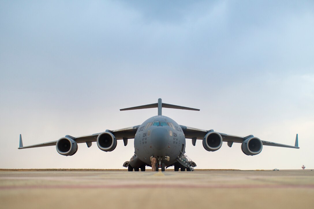 A crew member checks a C-17 at the airport in Irbil, Iraq, Oct. 20, 2015. U.S. Marine Corps Gen. Joseph F. Dunford Jr. visited Iraq to meet with leaders and troops and to get an assessment of the anti-ISIL campaign. DoD photo by D. Myles Cullen
