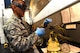 Staff Sgt. Derek Mclemore, 2nd Logistics Readiness Squadron fuels laboratory technician, tests the fuel for dirty particles at Barksdale Air Force Base, La., Oct. 14, 2015. Fuel is tested to ensure it reaches the standard cleanliness which ultimately makes planes run better and last longer. (U.S. Air Force Photo/Airman 1st Class Luke Hill)