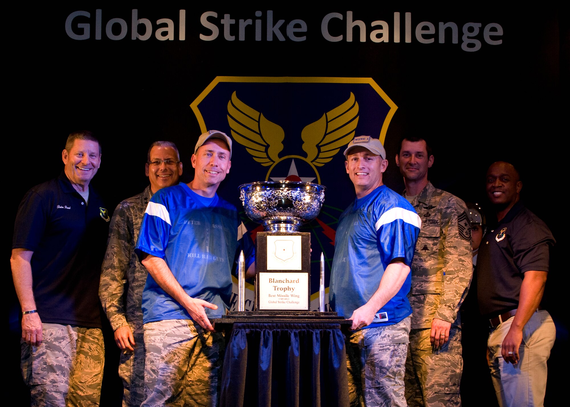 Col. John T. Wilcox, 341st Missile Wing commander, accepts the Blanchard Trophy for the best ICBM wing in the Air Force on behalf of the Airmen of Malmstrom Air Force Base, Mont., at the 2015 Global Strike Challenge trophy presentation at Barksdale AFB, La., Oct. 21, 2015. Global Strike Challenge is the nation’s premier bomber, ICBM, helicopter operations and security forces competition with units from Air Force Global Strike Command, Air Combat Command, Air Force Reserve Command and the Air National Guard. (U.S. Air Force photo/Senior Airman Joseph Raatz)