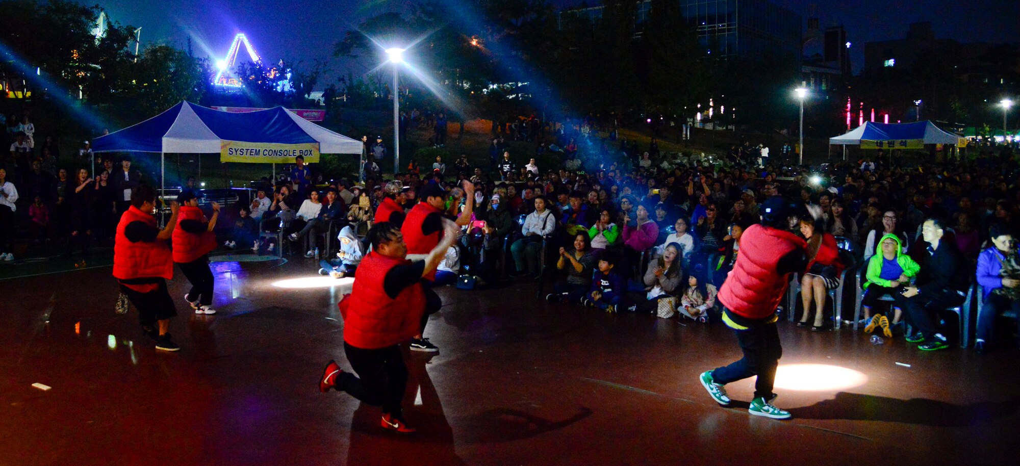 Korean dance group “Dungpak” performs during the 12th annual Korean American Friendship Festival in the Songtan Entertainment District, Republic of Korea Oct. 17, 2015. Although the festival featured many traditional Korean dances, the new-age “K-pop” trend was also showcased. K-pop, or Korean popular music is comprised of dance, pop, ballad, electronic, rock, metal, hip-hop and R&B. K-Pop, becoming increasingly popular in many parts of the world, allows South Korea to utilize its pop culture to tap into the foreign entertainment markets. (U.S. Air Force photo/Senior Airman Kristin High)