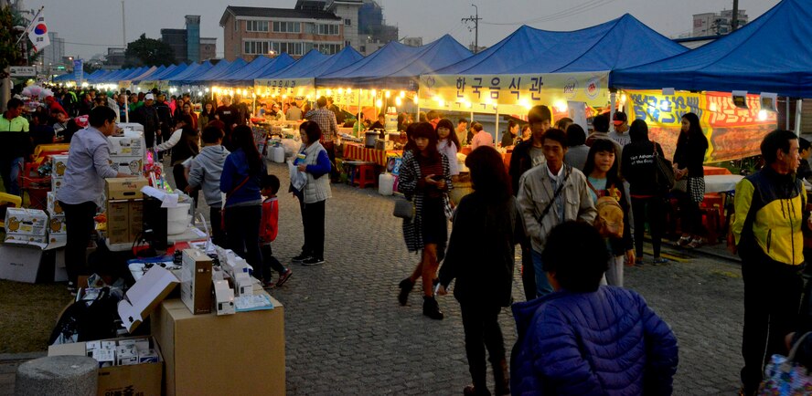 Booths line the streets during the 12th annual Korean American Friendship Festival in the Songtan Entertainment District, Republic of Korea Oct. 17, 2015. The festival took place outside the gates of Osan Air Base where Koreans and Americans came out to enjoy a variety of food, entertainment booths and the chance to buy souvenirs. (U.S. Air Force photo/Senior Airman Kristin High)