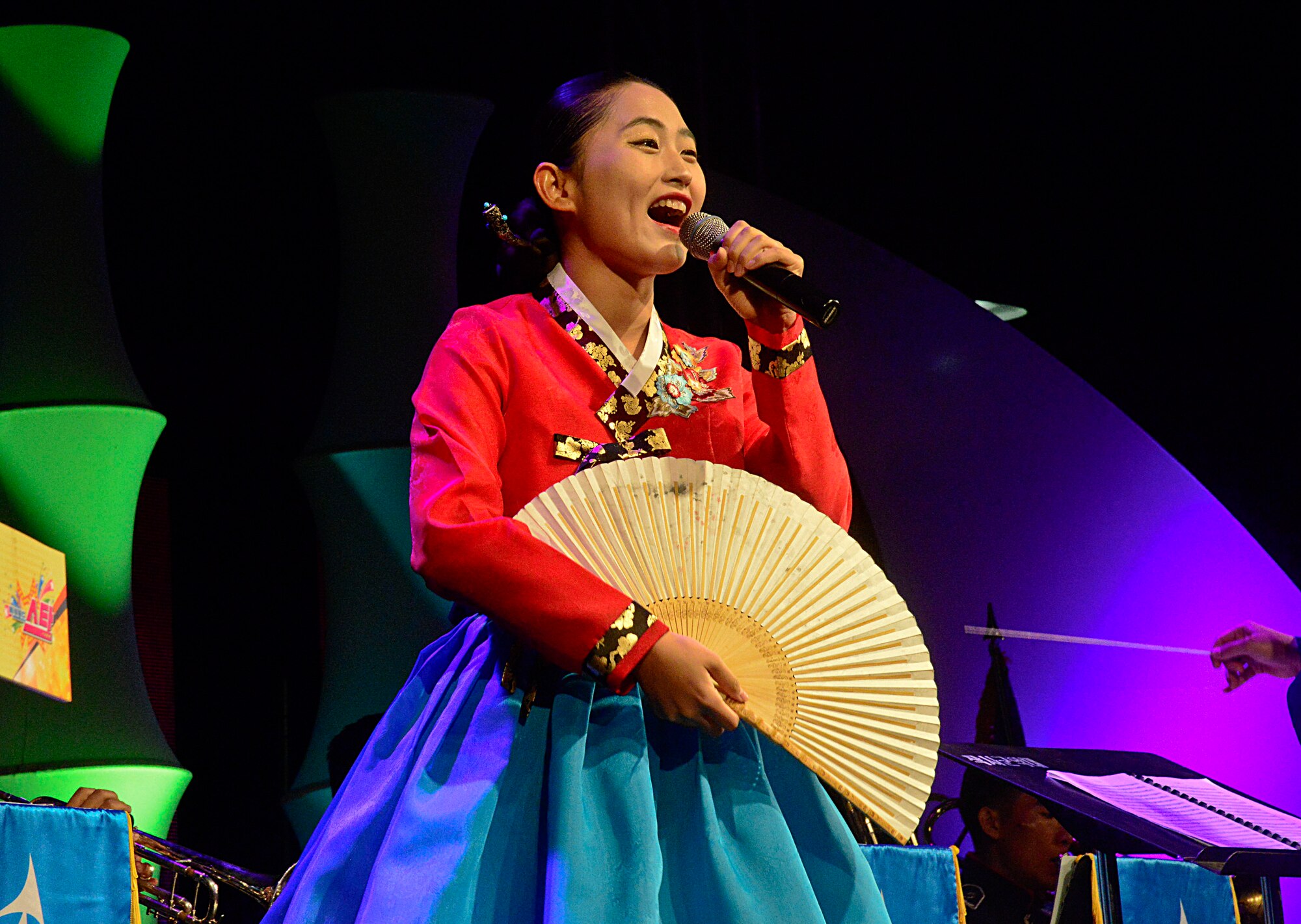 A woman sings traditional Korean songs during the 12th annual Korean American Friendship Festival in the Songtan Entertainment District, Republic of Korea Oct. 17, 2015. The two-day festival was designed to celebrate the long-standing friendship between the U.S. and ROK. There was a myriad of demonstrations and performances involving Korean traditions and culture along with new-age performances. (U.S. Air Force photo/Senior Airman Kristin High)