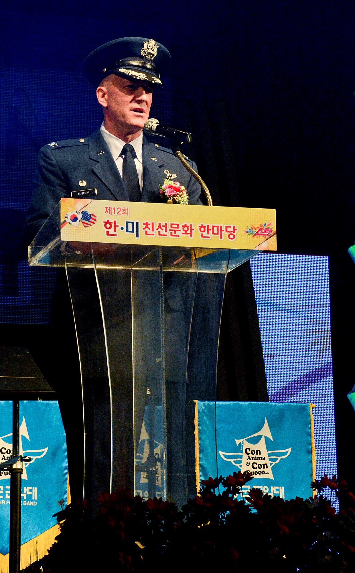 Col. Andrew Hansen, 51st Fighter Wing commander, speaks during the opening ceremony of the 12th annual Korean American Friendship Festival in the Songtan Entertainment District, Republic of Korea Oct. 17, 2015. The festival slogan, “Gatchi kapshida, Choen eeut doepshida,” translates to, “We go together, Be a good neighbor,” is said to reinforce the bond between the U.S. and the ROK. Hansen spoke of the relationship built between the two countries and continuing the bond. (U.S. Air Force photo/Senior Airman Kristin High)