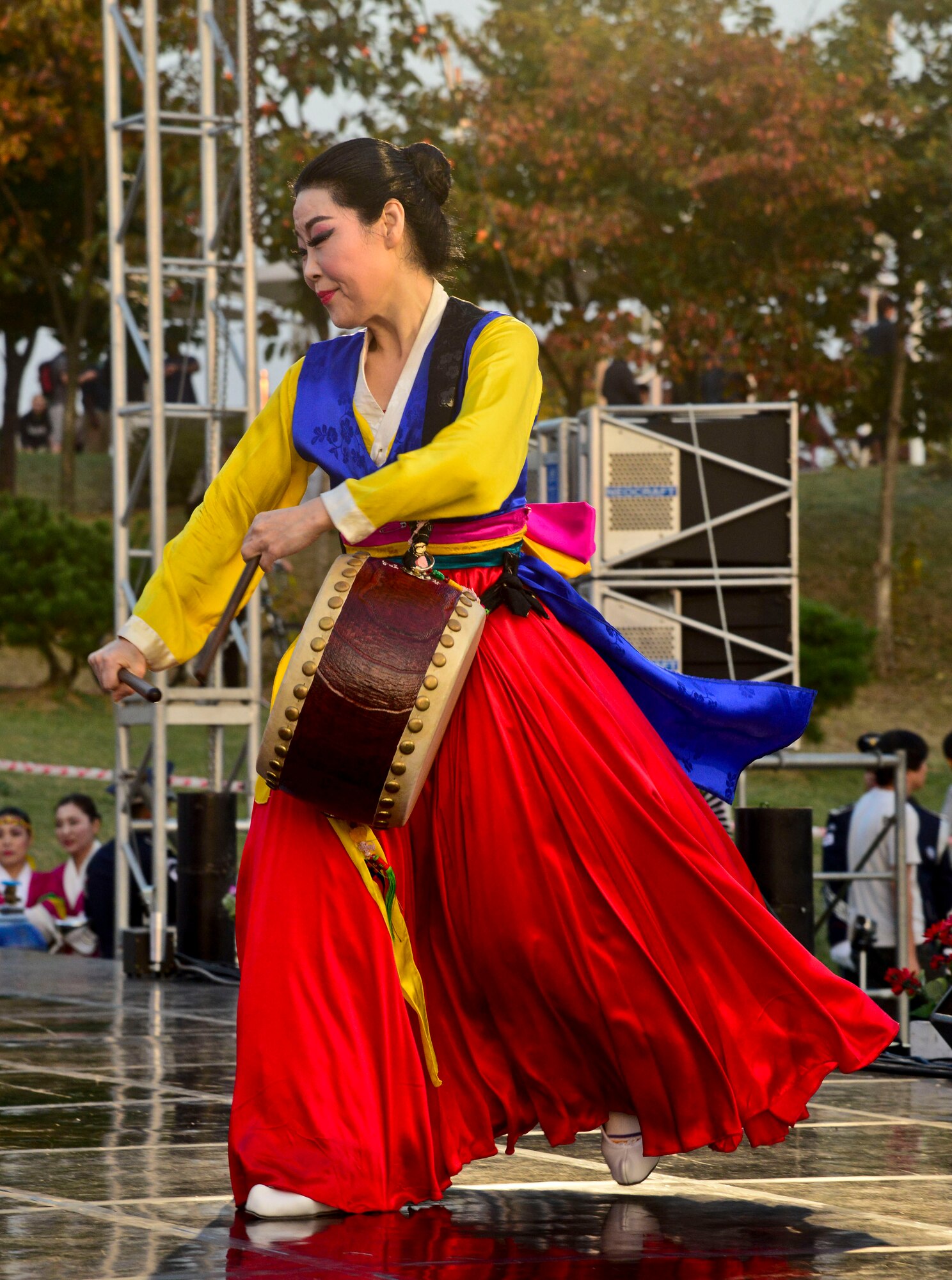 A Korean woman performs a traditional Korean drum routine called Ogomu during the 12th annual Korean American Friendship Festival in the Songtan Entertainment District, Republic of Korea, Oct. 17, 2015. The cultural festival was held Oct. 18 and 19 and highlighted Korean foods, various activities and both traditional and modern performances by both Americans and Koreans. (U.S. Air Force photo/Senior Airman Kristin High)