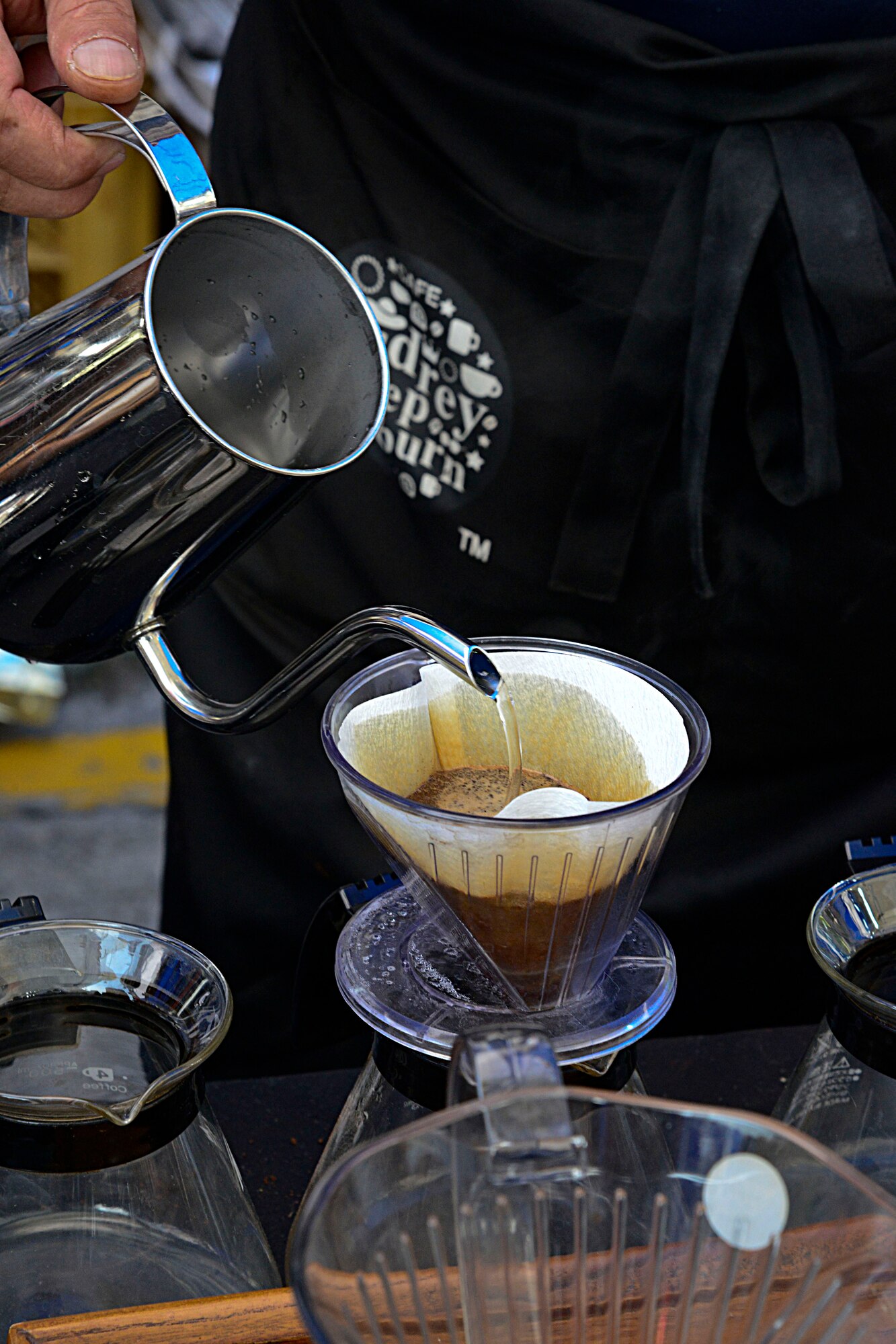 A vendor makes hand-dripped coffee during the 12th annual Korean American Friendship Festival in the Songtan Entertainment District, Republic of Korea, Oct. 17, 2015. Koreans and Americans came out to enjoy a variety of food, entertainment booths and the chance to buy souvenirs. (U.S. Air Force photo/Senior Airman Kristin High)