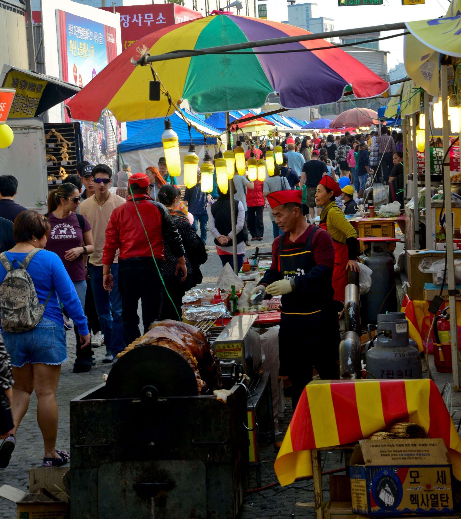Korean and American food, merchandise and game booths line the streets during the 12th annual Korean American Friendship Festival in the Songtan Entertainment District, Republic of Korea, Oct. 17, 2015. The festival is a two-day event designed to celebrate the long-standing friendship between the U.S. and ROK. (U.S. Air Force photo/Senior Airman Kristin High)