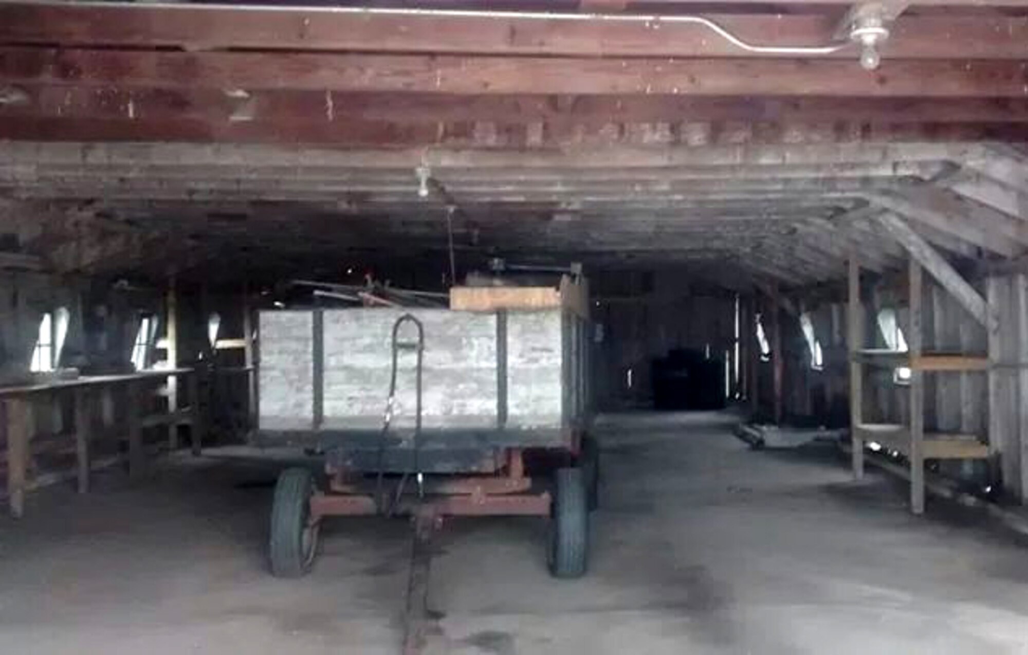 Nestled between three cornfields on a 200-acre farm in Iowa, this 45-by-60 foot wooden shed had, like a mother to her child, sheltered the nuts and bolts, the tools, and the vehicles the Clausen family used to get their work done for 37 years. (Courtesy Photo)