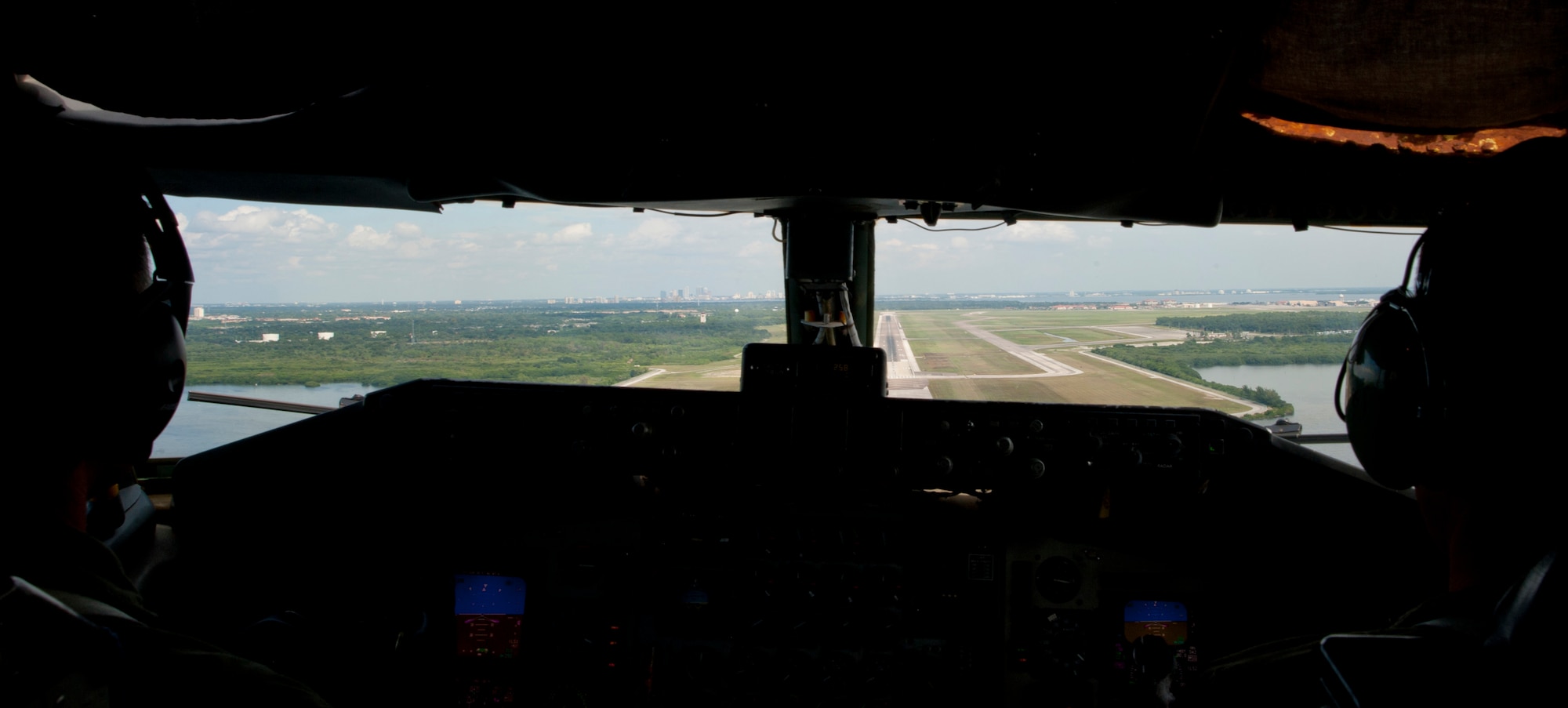 Col. Daniel Tulley, 6th Air Mobility Wing commander, and Capt. David Sproul, 91st Air Refueling Squadron pilot, prepare to land at MacDill Air Force Base, Fla., Oct 13, 2015. MacDill’s aerial refueling enables the U.S. to project might and mercy anywhere in the world within a matter of hours. (U.S. Air Force photo by Airman 1st Class Mariette M. Adams/Released)