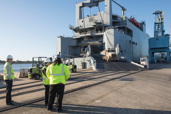The United States Naval Ship Red Cloud is docked at Joint Base Charleston – NWS, S.C. for its maintenance cycle on Oct. 20, 2015. Representatives from Honeywell, International Long Shoreman’s Association, Shippers Stevedoring Company and the 841st Transportation Battalion were all involved in the unloading process. (U.S. Air Force Photo/Airman 1st Class Thomas Charlton)