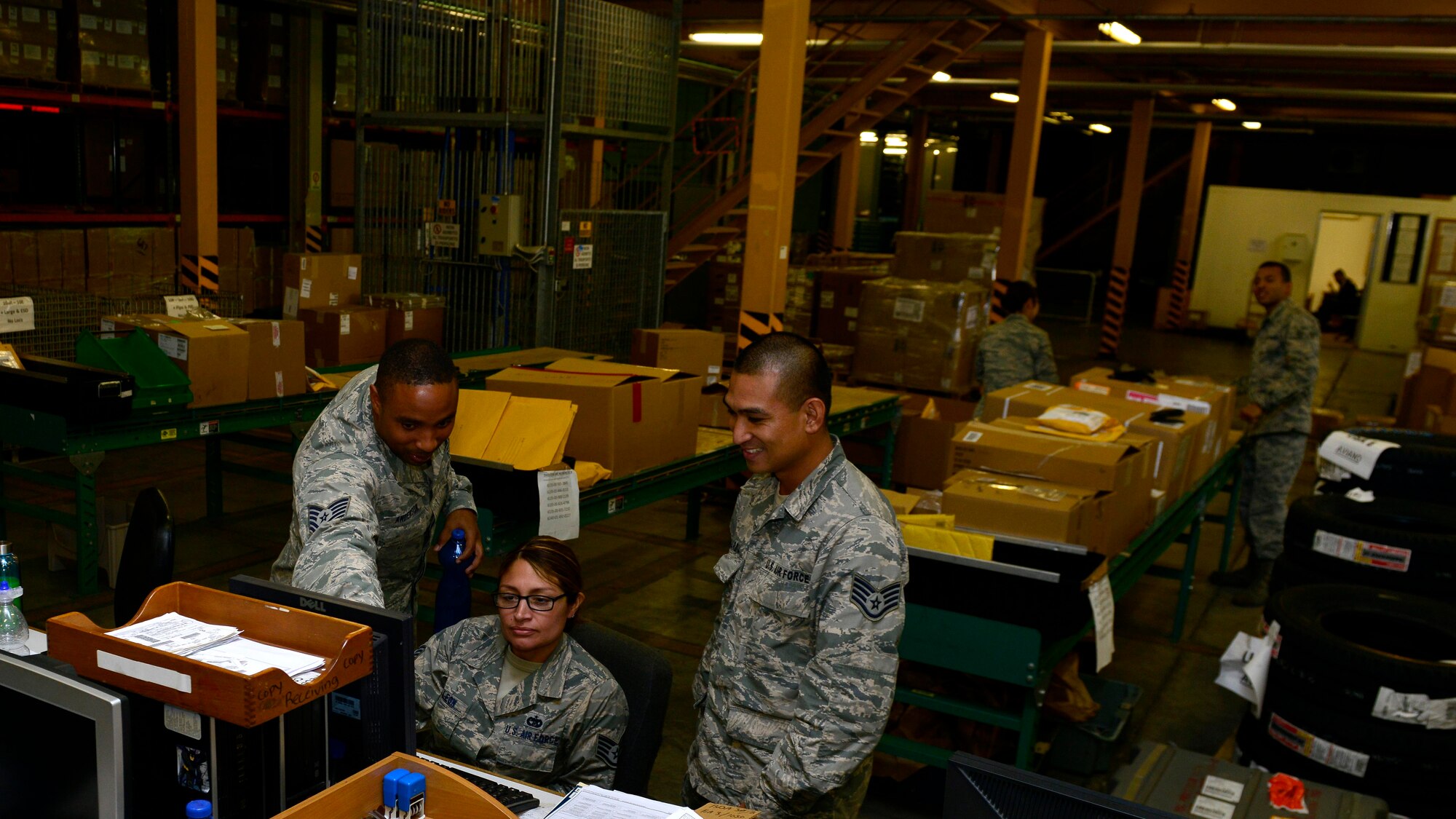 U.S. Air Force Airmen evaluate in-coming shipments of supplies, Oct. 14, 2015, at Aviano Air Base, Italy. The 31st Logistics Readiness Squadron in-bound cargo office ensures all supplies are handled properly and received at the correct locations on time. (U.S. Air Force photo by Airman 1st Class Cary Smith/Released)