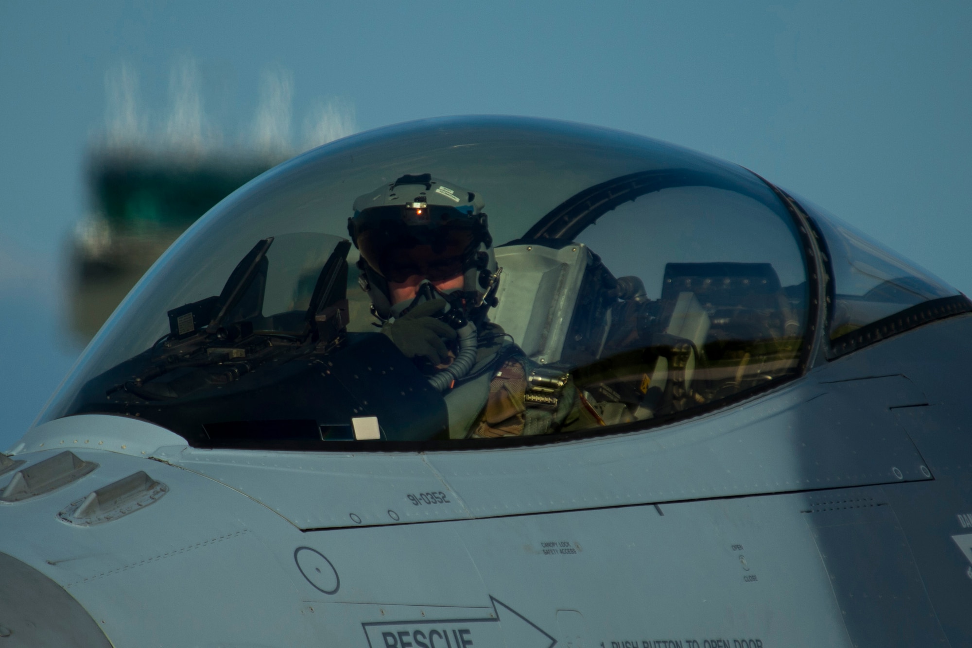 An F-16 Fighting Falcon fighter aircraft pilot, assigned to 480th Fighter Squadron at Spangdahlem Air Base, Germany, taxis an F-16 during the Trapani Air Show at Trapani Air Base, Italy, Oct. 19, 2015. The Trapani Air Show kicked off Trident Juncture 2015, a training exercise involving more than 30 Allied and Partner Nations taking place throughout Italy, Portugal, Spain, the Atlantic Ocean, the Mediterranean Sea, Canada, Norway, Germany, Belgium and the Netherlands. (U.S. Air Force photo by Airman 1st Class Luke Kitterman/Released
