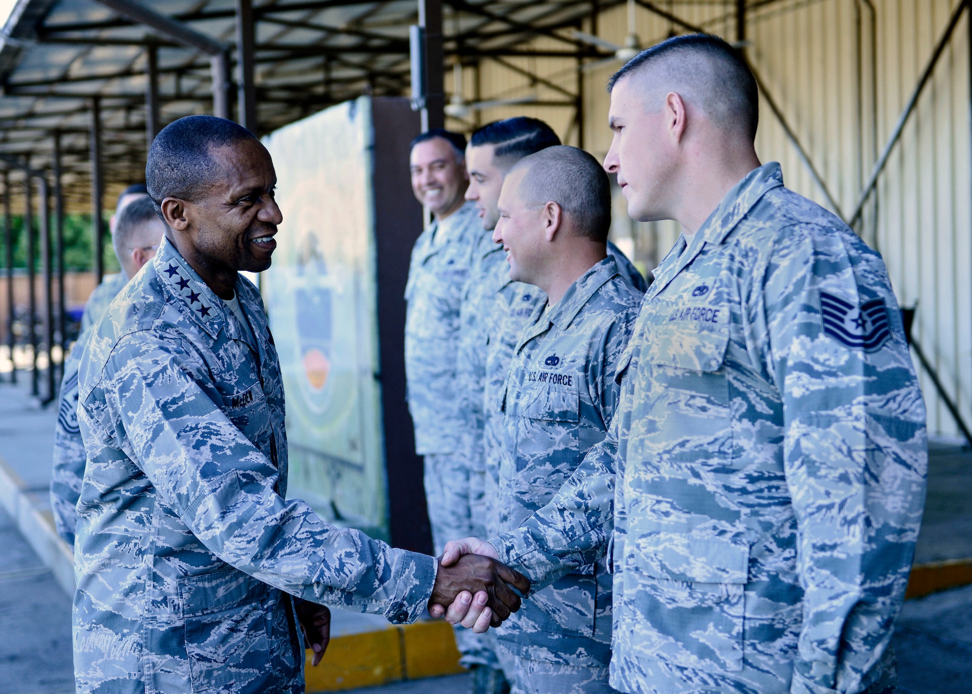 Gen. Darren McDew, U.S. Transportation Command commander, visits with Incirlik Airmen and leadership Oct. 17, 2015, at Incirlik Air Force Base, Turkey. McDew toured multiple base agencies to include the 728th Air Mobility Squadron, 39th Air Base Wing and units deployed to Incirlik AB. (U.S. Air Force photo by Airman 1st Class Cory W. Bush/Released)