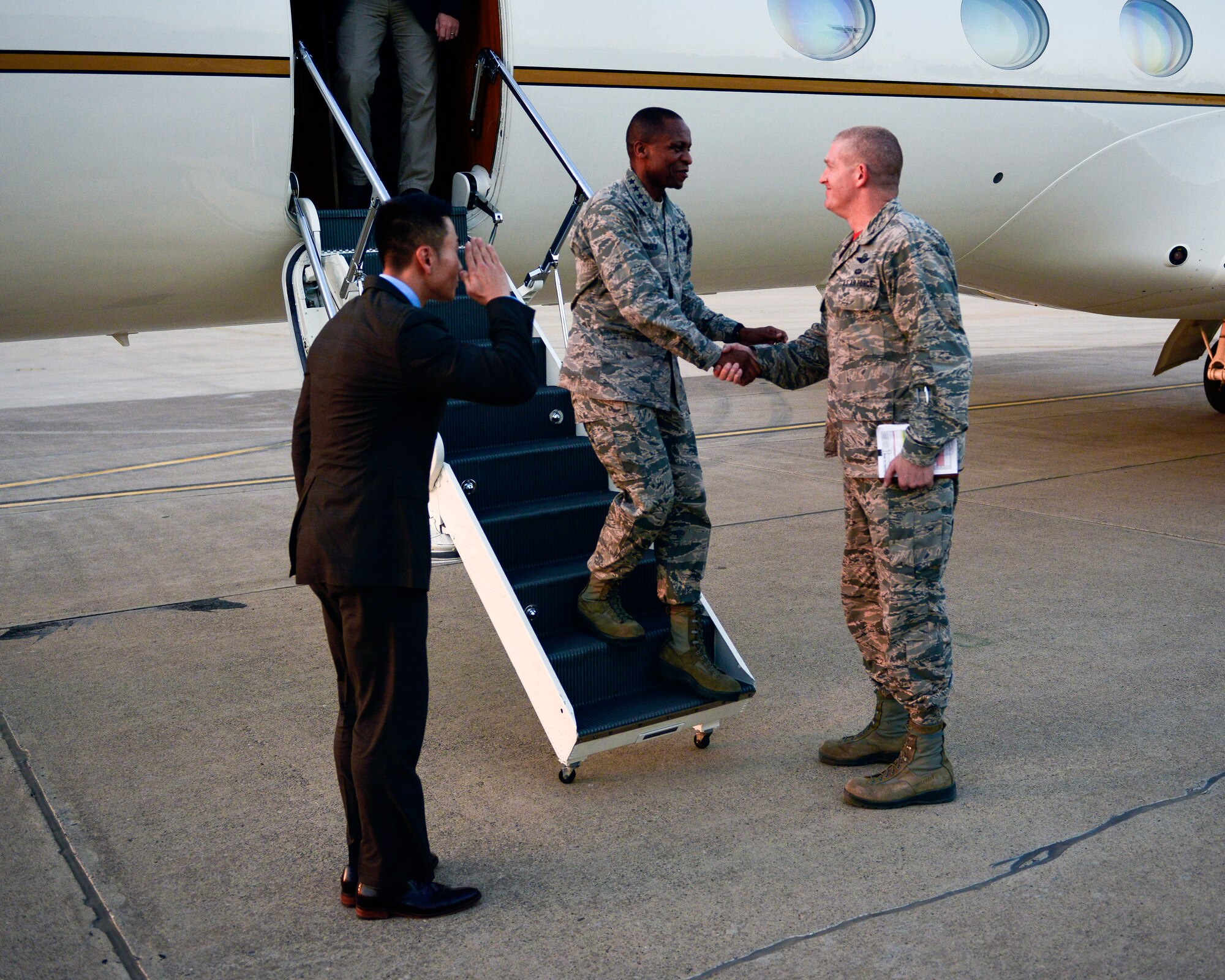 Col. John Walker, 39th Air Base Wing commander, greets Gen. Darren McDew, U.S. Transportation Command commander, Oct. 17, 2015, at Incirlik Air Force Base, Turkey. McDew toured multiple base agencies to include the 728th Air Mobility Squadron, 39th Air Base Wing and units deployed to Incirlik AB (U.S. Air Force photo by Airman 1st Class Cory W. Bush/Released)