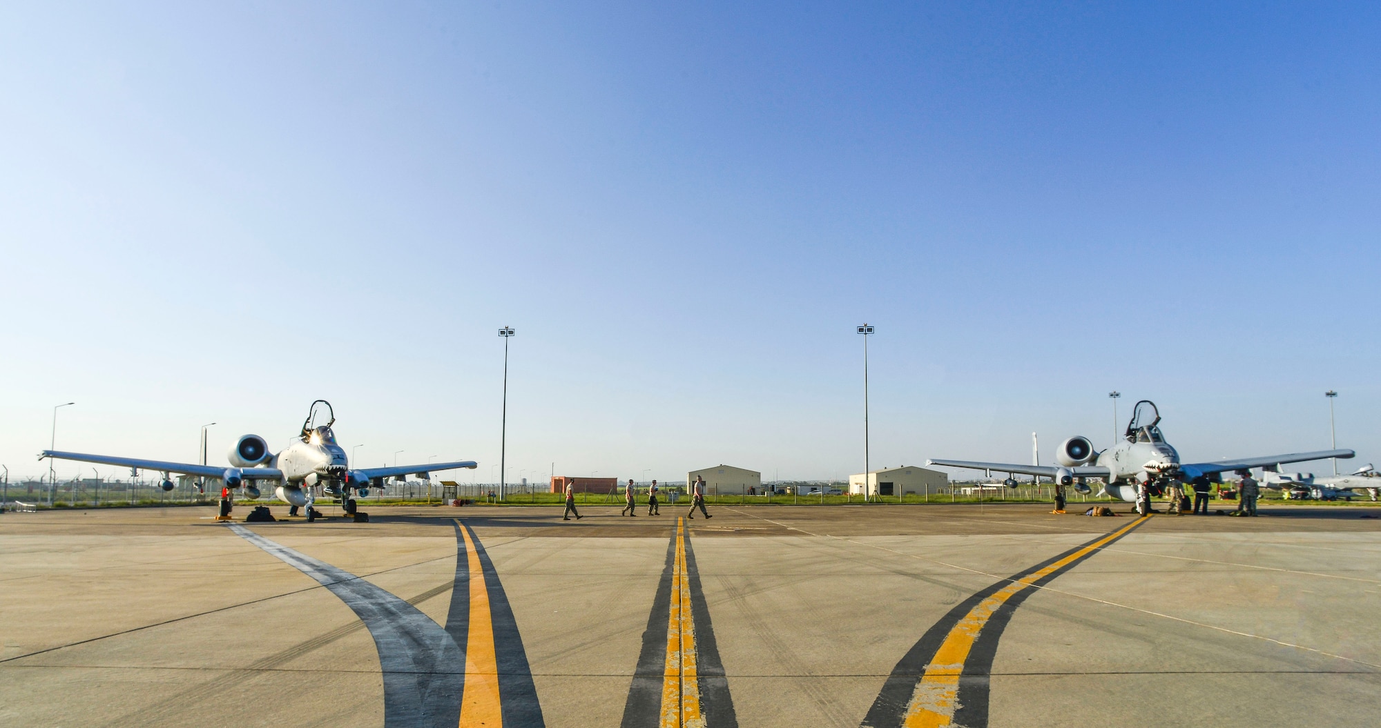 Two A-10C Thunderbolt II attack  aircraft are parked on the flight line after landing at Incirlik Air Base, Turkey, Oct. 15, 2015. The aircraft are deployed to Turkey in support of the Coalition effort against ISIL and Operation Inherent Resolve. (U.S. Air Force photo by Airman 1st Class Cory W. Bush/Released)