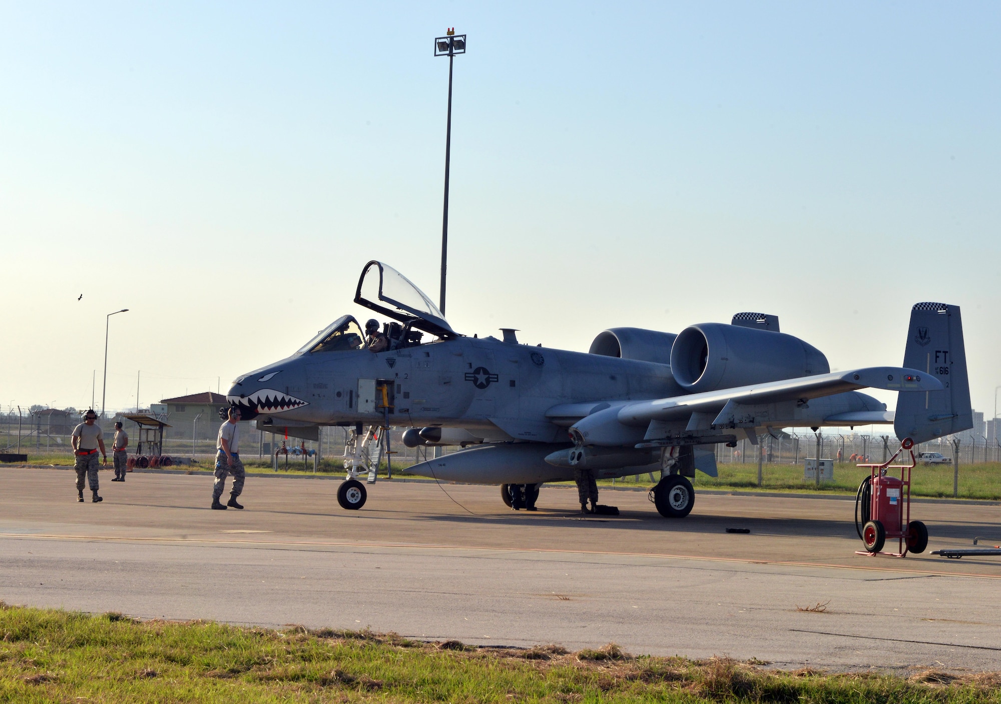 An aircrew prepares to unload an A-10C Thunderbolt II attack aircraft at Incirlik Air Base, Turkey Oct. 15, 2015. The aircraft is deployed to Incirlik AB in support of Operation Inherent Resolve. The U.S. and Turkey, as members of the 60-plus nation coalition, are committed to the fight against ISIL in pursuit of peace and stability in the region. (U.S. Air Force photo by  Senior Airman Michael Battles/Released)