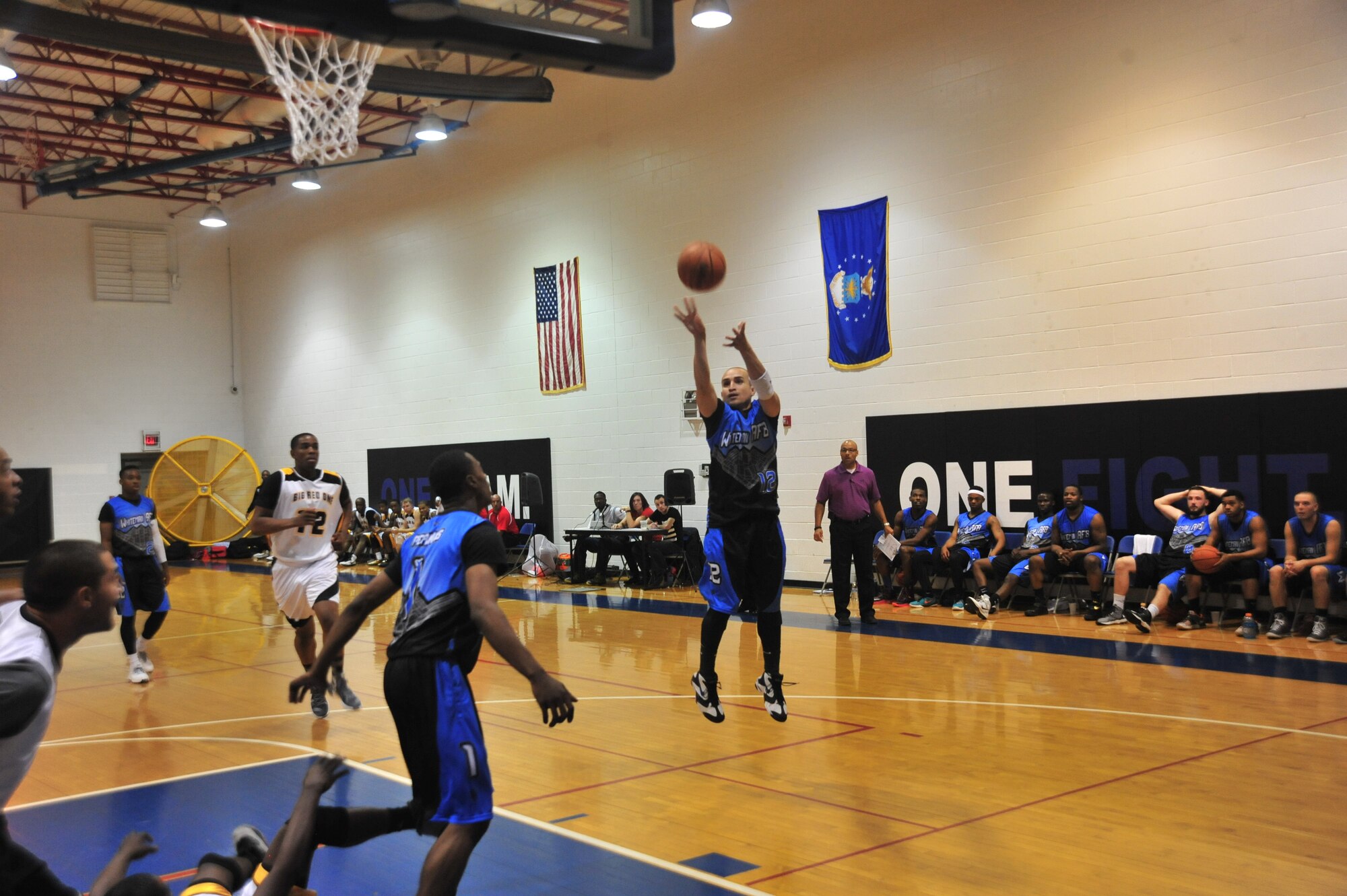 U.S. Air Force Senior Airman Ismael Otero, 509th Munitions Squadron, shoots an open jump shot during the Whiteman Varsity basketball game at Whiteman Air Force Base, Mo., Oct. 10, 2015. Whiteman is scheduled to play their next game against the varsity team of Tinker Air Force Base, OK.   U.S. Air Force photo by Airman 1st Class Jovan Banks/released