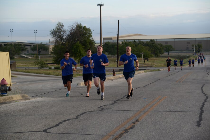 Competitors in the 2015 Wingman Challenge run on Laughlin Air Force Base, Texas, Oct. 17, 2015. The goal of the Wingman Challenge is to start and finish as a team. This year’s 5K winning team, the Quintastic team, finished the race in 21 minutes and 7 seconds. (U.S. Air Force photo by Airman 1st Class Ariel D. Partlow)(Released)