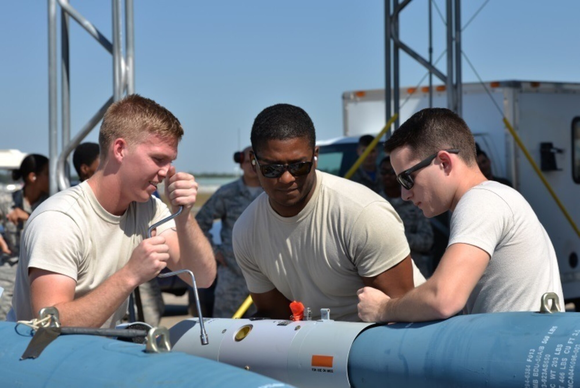 Airmen from the 33rd Aircraft Maintenance Squadron prepare a guided bomb unit-12 to be loaded onto an F-35A Lightning II Oct. 16 at Eglin Air Force Base, Fla. Load crew members worked together to assemble the missile before loading it into the aircraft. (U.S. Air Force Photo/Senior Airman Andrea Posey)