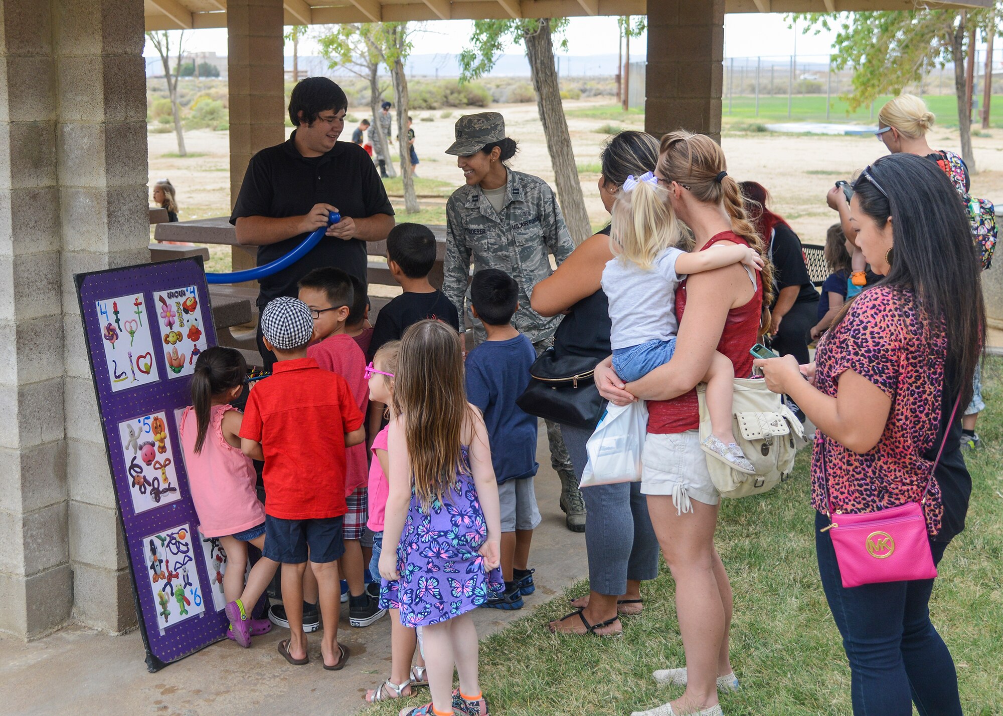 Children at the Family Fall Festival lined up for balloon characters and face painting. (U.S. Air Force photo by Rebecca Amber)