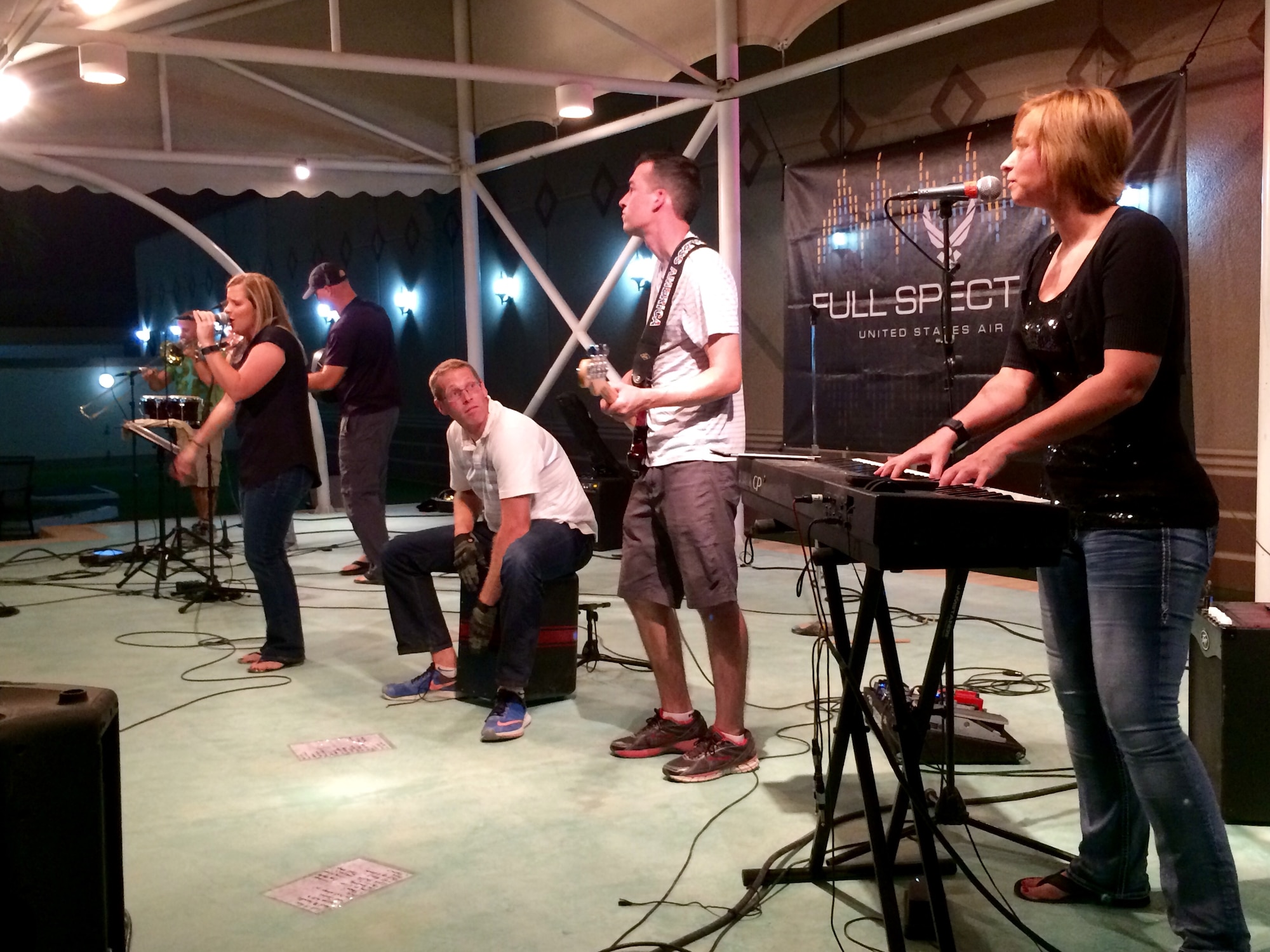 Members of the U.S. Air Forces Central Command band Full Spectrum ensemble entertain active duty military and civilians at Eskan Village, Saudi Arabia on Oct. 15, 2015. Full Spectrum is from the U.S. Air Force Heritage of America Band, Joint Base Langley-Eustis, Virginia. The group is touring throughout the U.S. Air Forces Central Command area of responsibility to raise morale, perform in military ceremonies, and to reach out to local communities developing positive relationships between the U.S. and partner nations. (U.S. Air Force photo by Capt. Jason Plosch/Released)