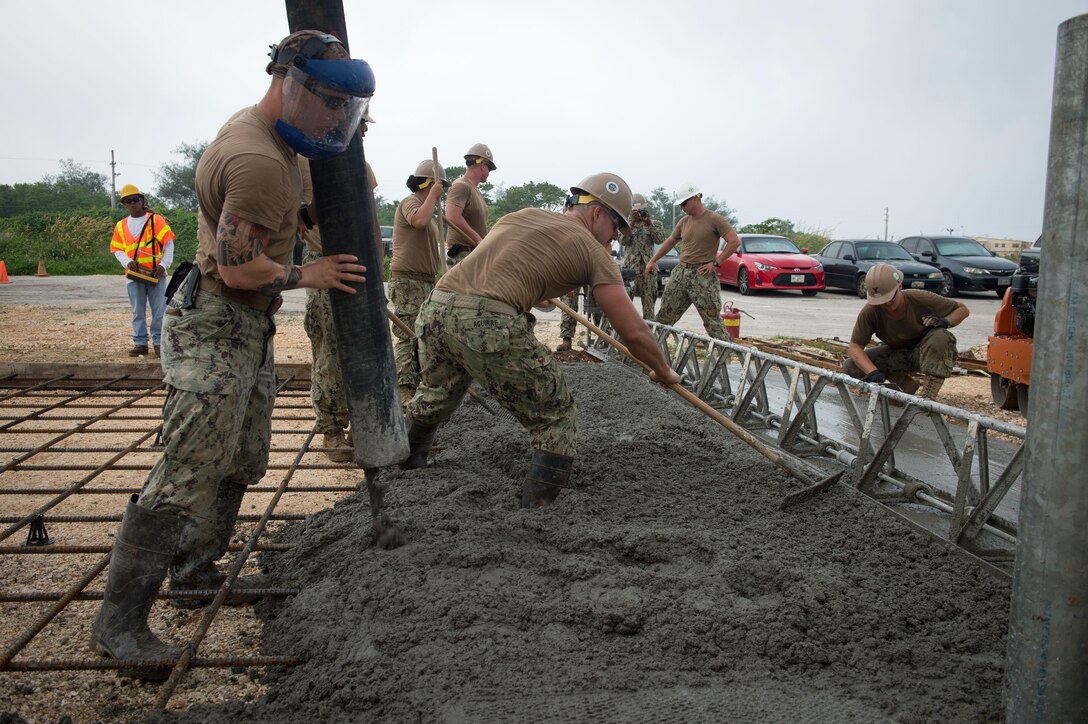 U.S. Navy Seabees place concrete during a construction project on Naval Base Guam, Guam, Oct. 20, 2015. U.S. Navy photo by Petty Officer 1st Class Ace Rheaume