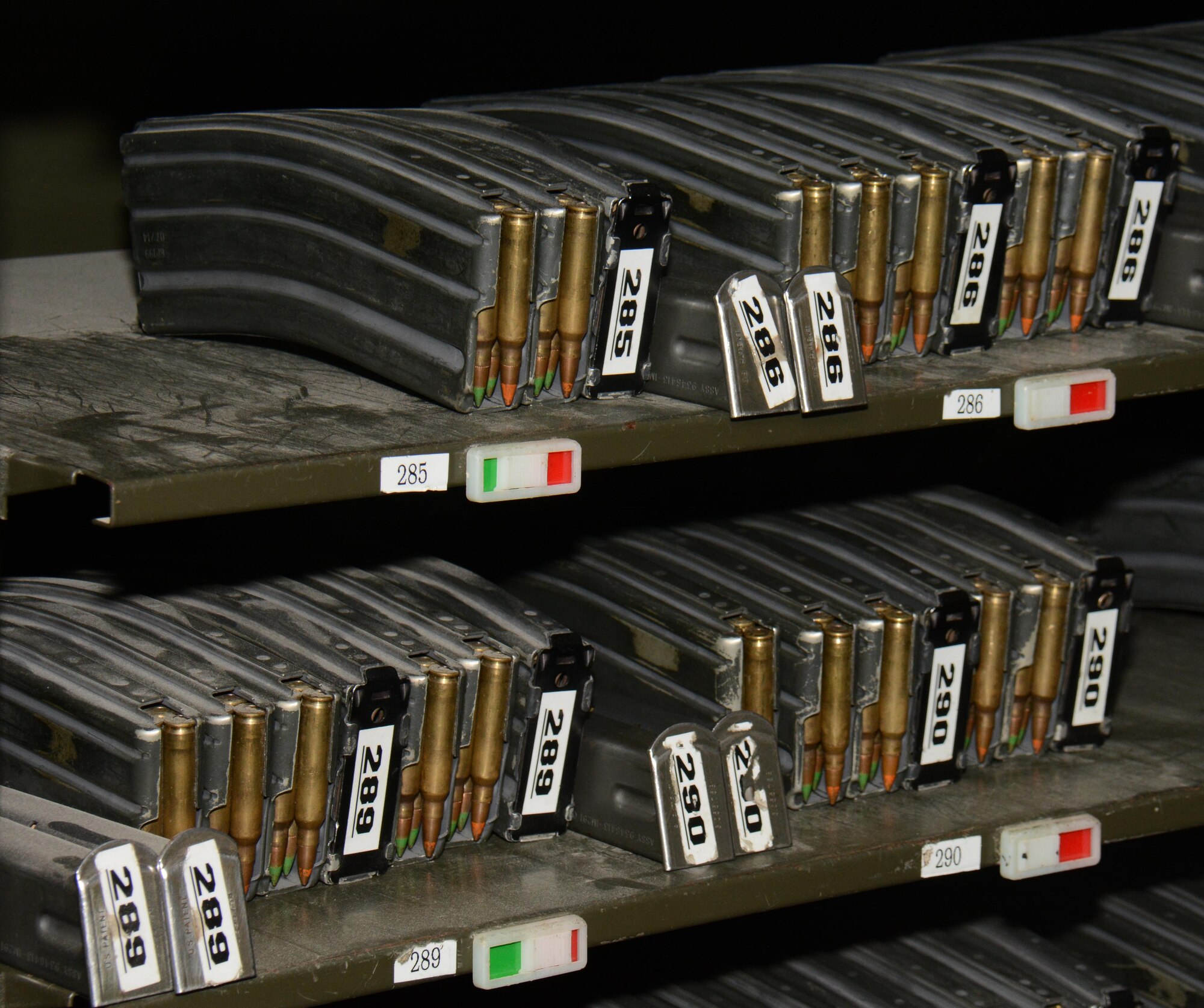 M-4 magazines filled with 5.56 mm ammunition sit on a shelf inside the 379th Security Forces Squadron Armory at Al Udeid Air Base, Qatar Oct. 22. Security Forces Airmen are issued numerous weapons from the facility to help protect the base including rifles, pistols and batons. The 379th SFS Armory maintains more than $5 million in weapons and equipment. (U.S. Air Force photo/Tech. Sgt. James Hodgman)