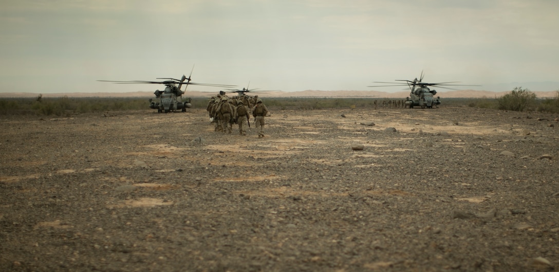 Marines board CH-53E Super Stallion helicopters during an assault support tactics exercise at Landing Zone Bull, Chocolate Mountain Aerial Gunnery Range, Calif., Oct. 12, 2015. The Marines are with Landing Support Company, 1st Transportation Support Battalion, 1st Combat Logistics Regiment. U.S. Marine Corps photo by Cpl. Summer Dowding       
