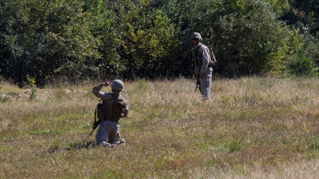 A Marine with 3rd Battalion, 6th Marine Regiment throws a simulated grenade during lane training at Marine Corps Base Camp Lejeune, N.C., Oct. 20, 2015. Marines with the company were required to assault a bunker and when within range, throw a grenade to eliminate any possible threats. The training consisted of four stations, each of which would provide instructions and hands-on training in radio communications, grenade employment, patrolling and emplacing M18 Claymores.