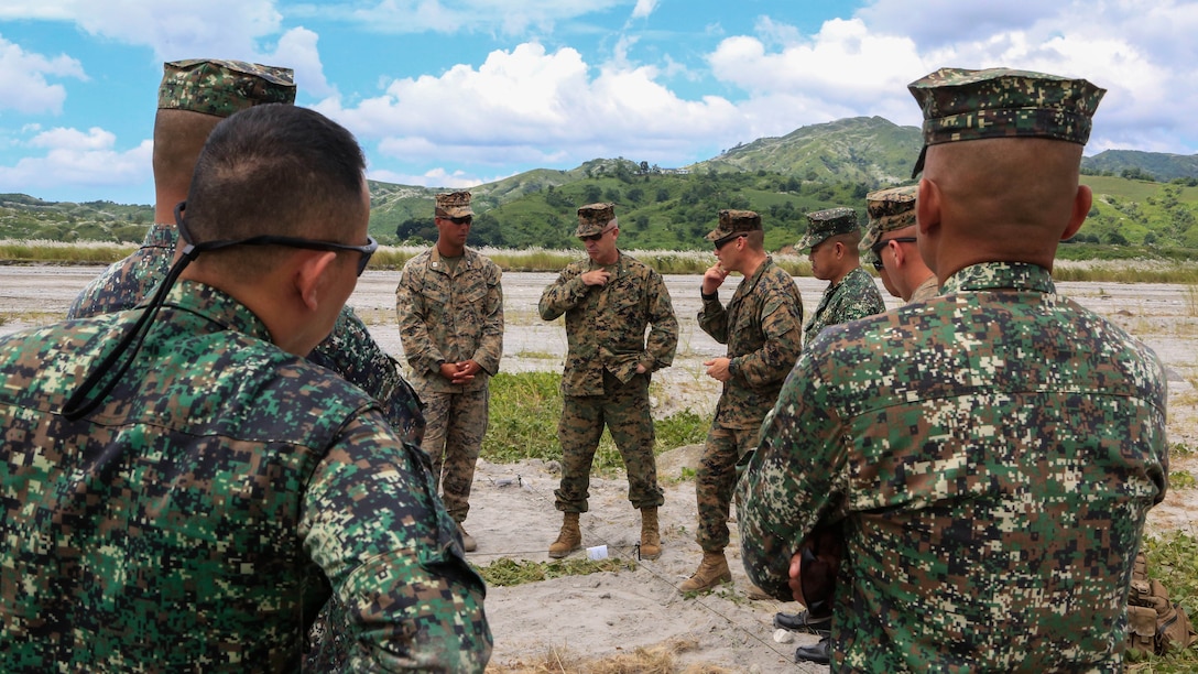 U.S. Marine Brig. Gen. Paul Kennedy, commanding general of 3rd Marine Expeditionary Brigade, speaks with Philippine Marines and U.S. Marines prior to live-fire training at Crow Valley, Philippines, Oct. 6, 2015 Philippine Marines with 31st Marine Company, Marine Battalion Landing Team 1, Armed Forces of the Philippines, and the U.S. Marines with Battalion Landing Team 2nd Battalion, 5th Marines, 31st Marine Expeditionary Unit, are training side by side as part of Amphibious Landing Exercise 2015, an annual bilateral training exercise conducted by members of the Armed Forces of the Philippines alongside U.S. Marine and Navy Forces.