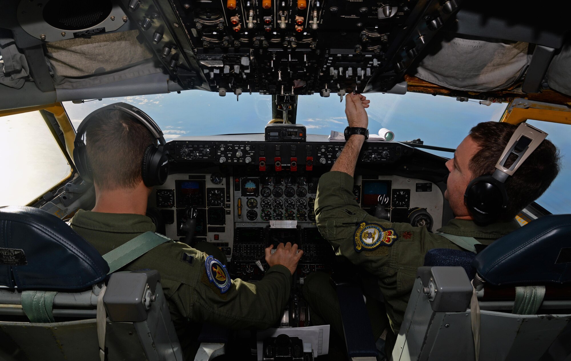Capt. RJ Allen, a 351st Air Refueling Squadron pilot, and Maj. Joseph Smith, a 351st ARS instructor pilot, fly to Son San Juan Air Base, Spain, for exercise Trident Juncture Oct. 20, 2015. The exercise will primarily be conducted in Spain, Portugal and Italy with additional activities in Belgium, Canada, Germany, the Netherlands, Norway and at sea in the Atlantic Ocean and Mediterranean Sea. (U.S. Air Force photo/Senior Airman Christine Halan)