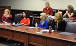 Annette Wiggins, spouse of Lt. Gen. Perry L. Wiggins, (left) discusses the upcoming forum minutes before it starts with other participants from around Fort Sam Houston. The live video teleconference of the AUSA family forums allowed those not able to attend a chance to watch and gather information to help with family health, resiliency and support.
