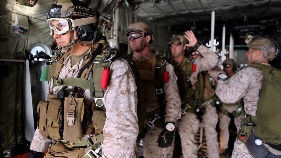 Marines with 1st Reconnaissance Battalion, 1st Marine Division prepare to conduct free fall jump training from a C-130 Hercules with 3rd Marine Aircraft Wing aboard Marine Corps Base Camp Pendleton, Calif., Oct. 16, 2015. 1st Recon conducted parachute operations in preparation for future deployments. 