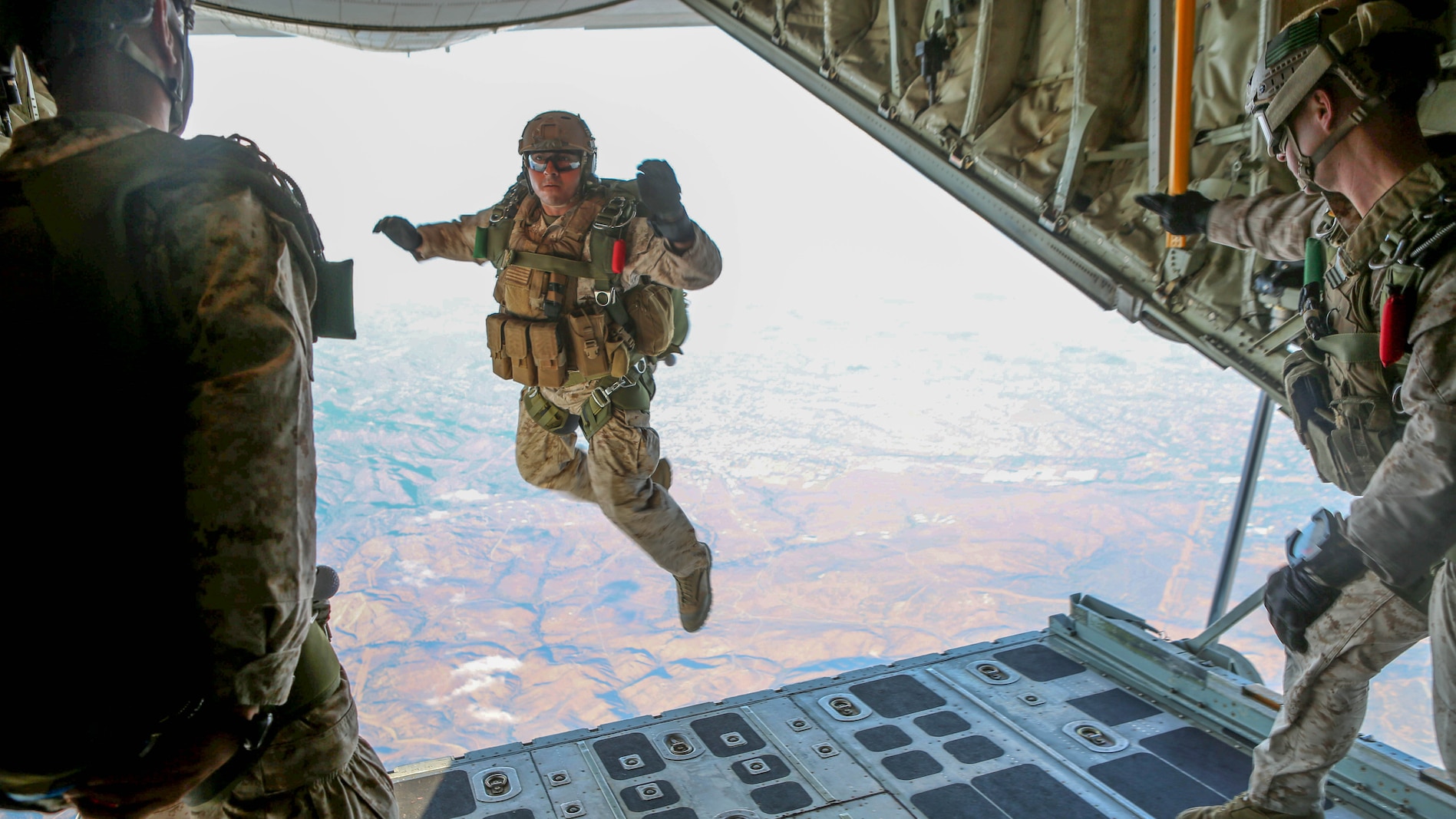 Marines with 1st Reconnaissance Battalion, 1st Marine Division conduct free fall jump training from a C-130 Hercules with 3rd Marine Aircraft Wing aboard Marine Corps Base Camp Pendleton, Calif., Oct. 16, 2015. 1st Recon conducted parachute operations in preparation for future deployments. 