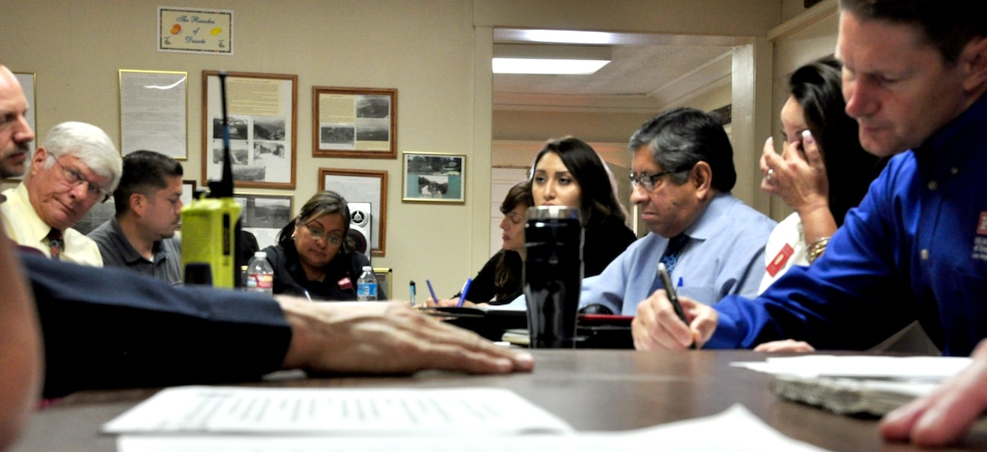 Members from U.S. Army Corps of Engineers Los Angeles District, U.S. Fish and Wildlife Service, Congresswoman Napolitano’s Office, Los Angeles County Fire Department, Azuza Police Department and the City of Duarte discuss the problems in cleaning up the San Gabriel River near Sana Fe Dam Oct. 21.