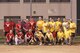 The 513th Air Control Group Thumpers and 507th Air Refueling Wing Okies pose for a group photo after playing a double header Oct. 15 at Tinker Air Force Base. The Thumpers retained the series trophy with two wins against the Okies, widening their all-time record to 55-44.  Air Force photo by Staff Sgt. .Caleb Wanzer/Released